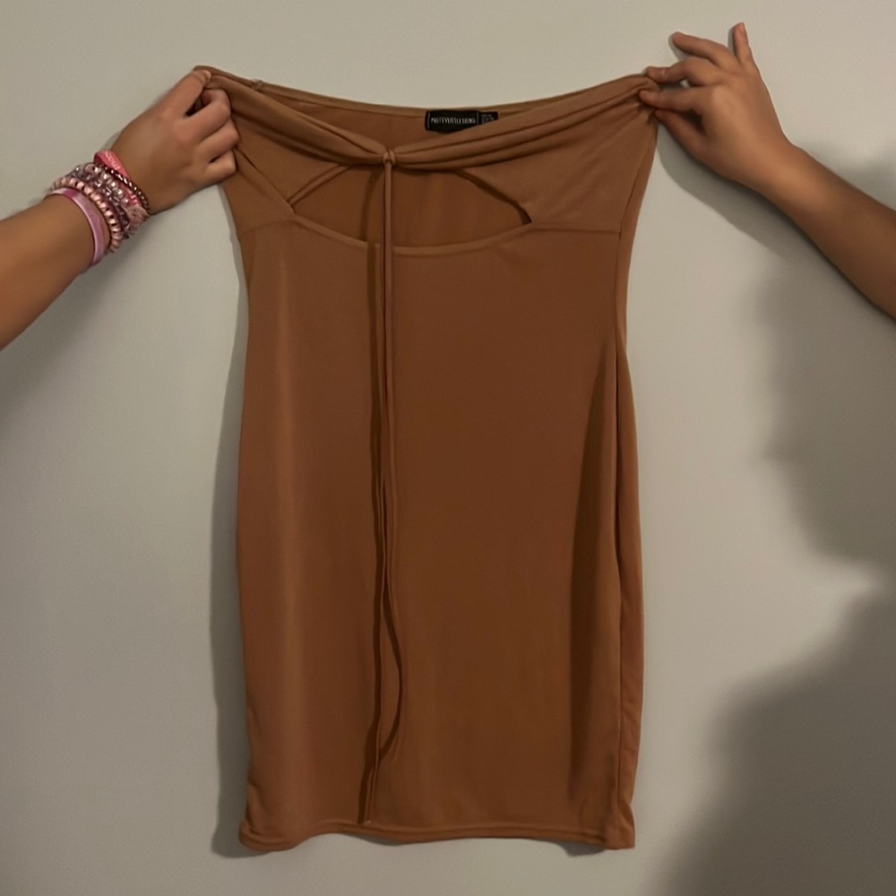 Camel colored strapless dress with cutout